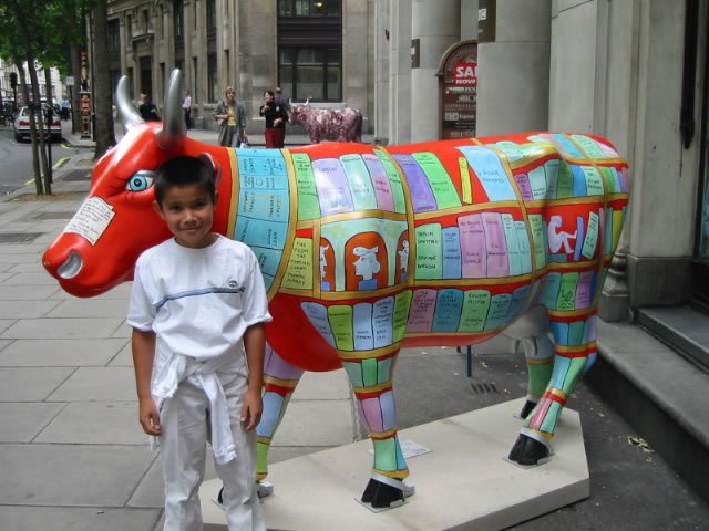 Max standing by the book cow, last spotted on Argyll Street in London
