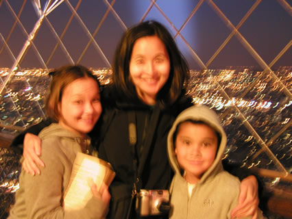 Lauren, Lori and Max at Eiffel Tower, freezing