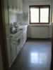 Left side of kitchen.  Cabinets in near left are actually fridge & freezer. (97,284 bytes)